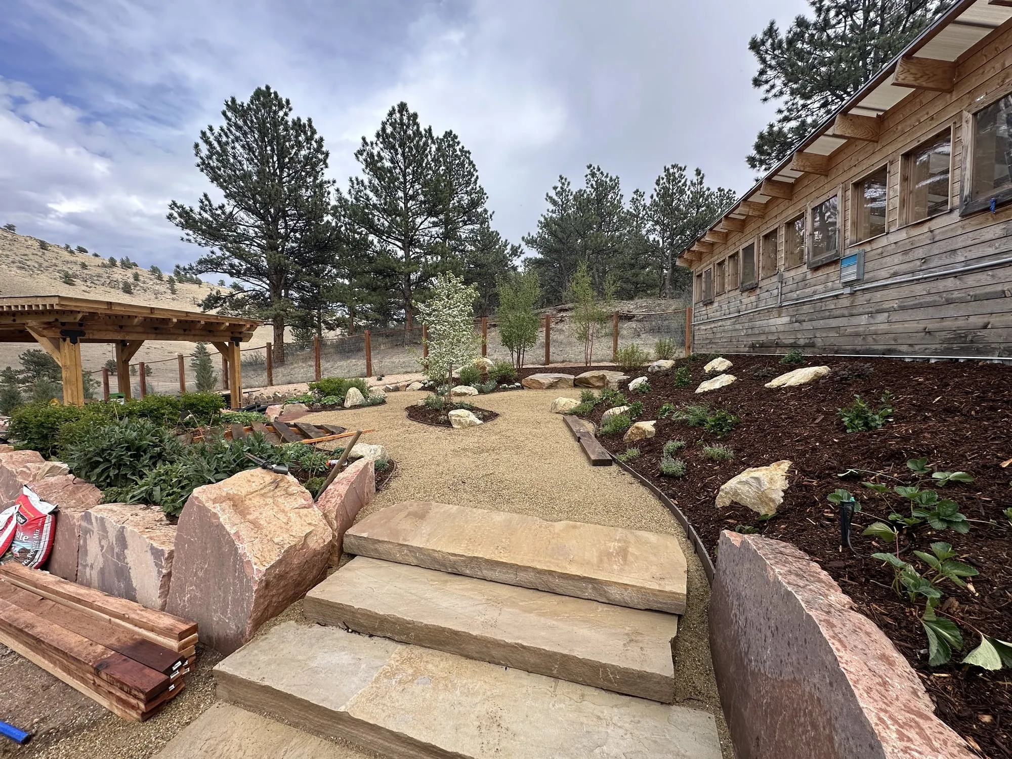Natural flagstone steps and boulder landscaping