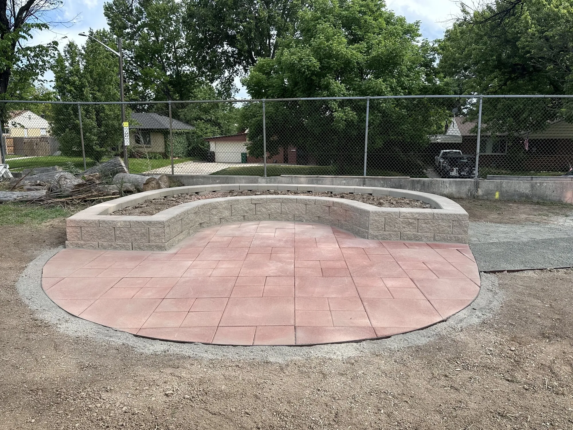 Newly installed circular paver patio
