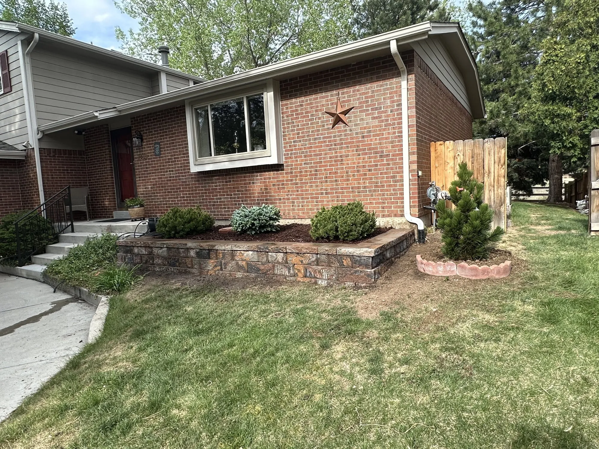 Fresh sod and landscaping with a healthy green lawn